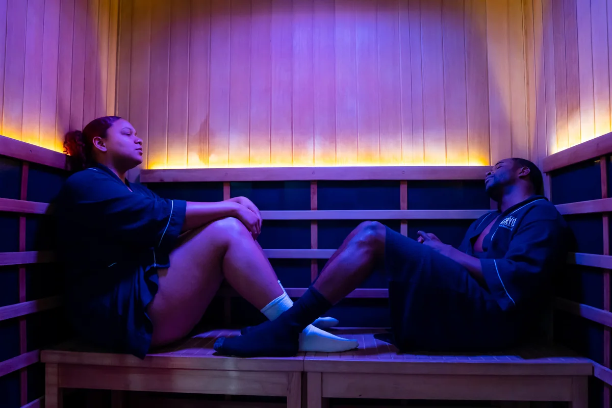 Two clients seated on sauna benches — iCRYO Westminster, CO wellness guide