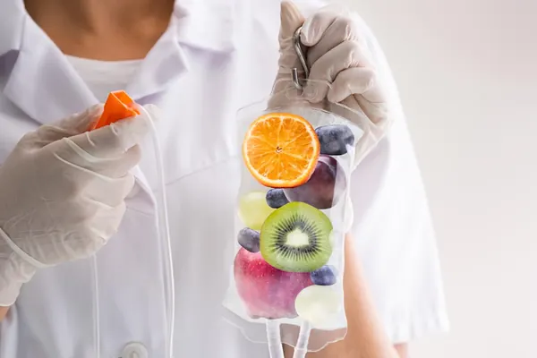 IV bag shown beside fresh citrus fruit — iCRYO Westminster, CO wellness guide