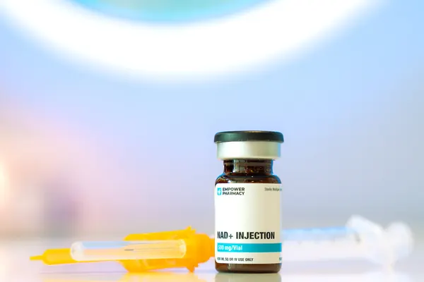 Nutrient vial and syringe on a treatment counter — iCRYO Westminster, CO wellness guide