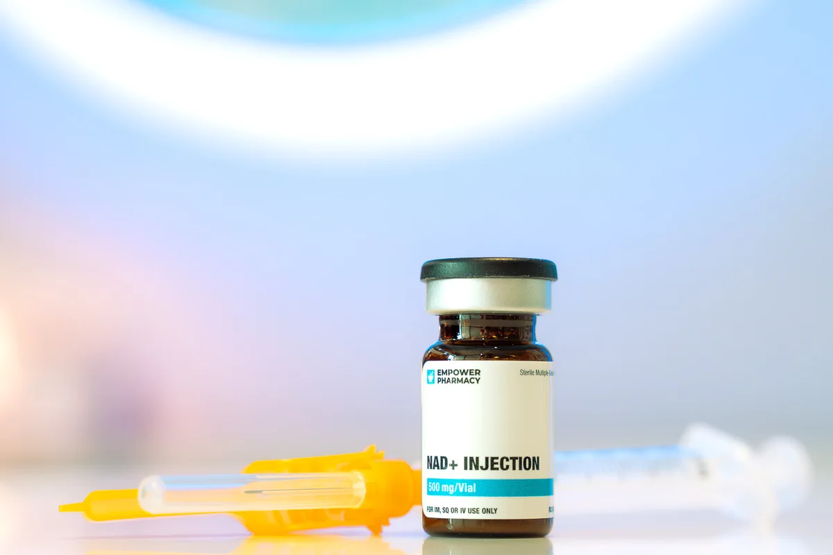 Nutrient vial and syringe on a treatment counter — iCRYO Westminster, CO wellness guide