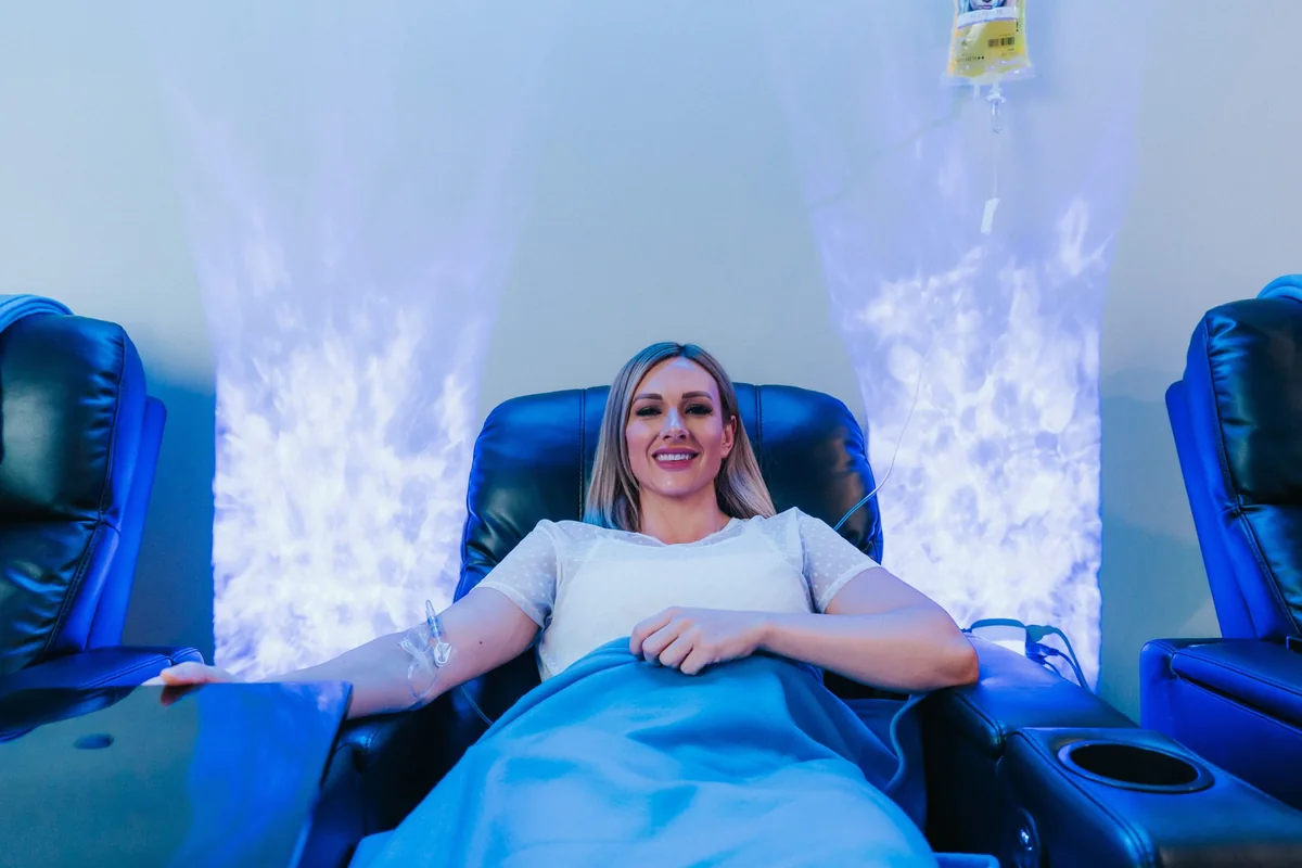 Client relaxing during an IV infusion — iCRYO Westminster, CO wellness guide