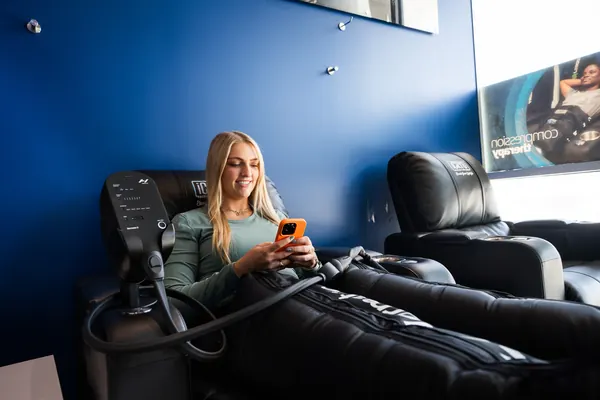 Client resting with pneumatic compression boots — iCRYO Westminster, CO wellness guide