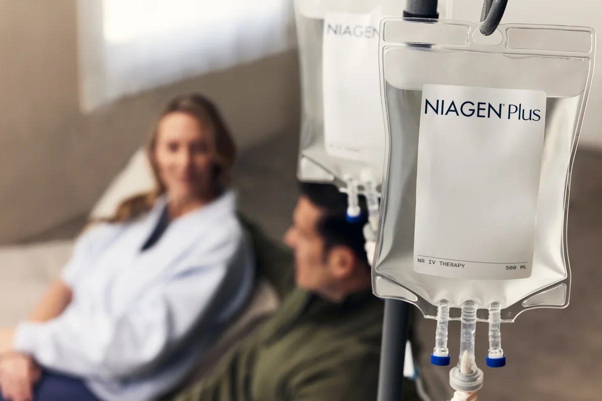 People relaxing near a Niagen infusion bag — iCRYO Westminster, CO wellness guide