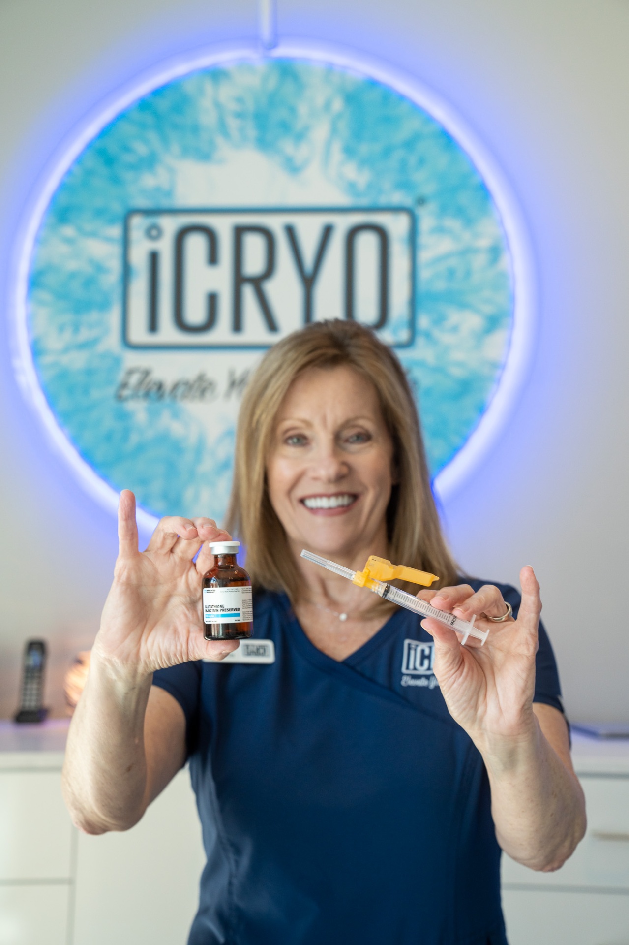 iCRYO Westminster registered nurse holding glutathione IM shot vial and syringe