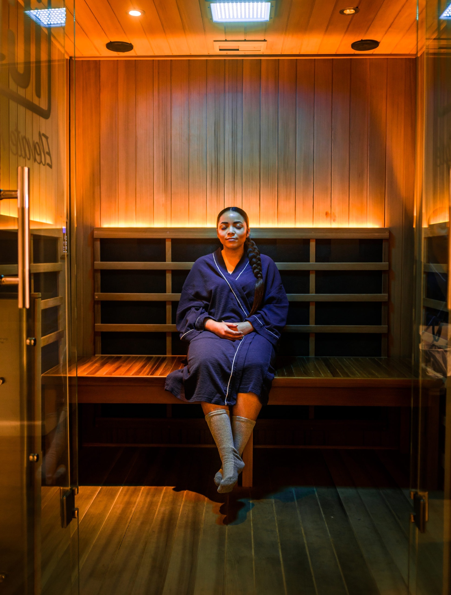iCRYO Westminster guest relaxing in a private infrared sauna suite
